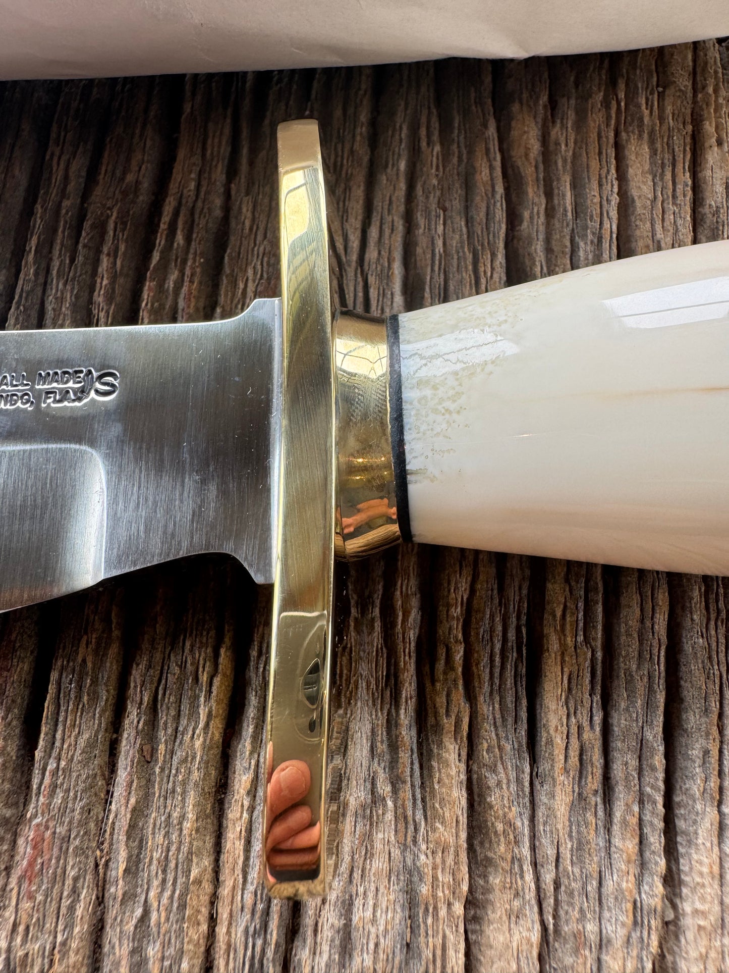 New in paper Randall Knife Model 12-8 Big Bear. Gorgeous piece of off white Fossil Walrus Ivory. Brass hilt, collar and butt cap, Stainless steel.