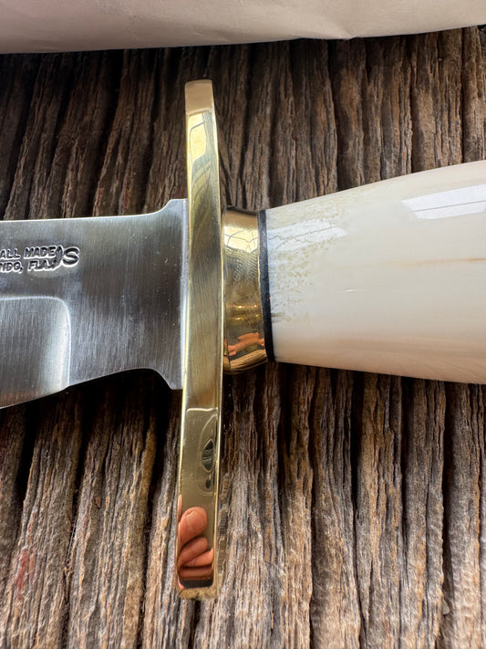 New in paper Randall Knife Model 12-8 Big Bear. Gorgeous piece of off white Fossil Walrus Ivory. Brass hilt, collar and butt cap, Stainless steel.