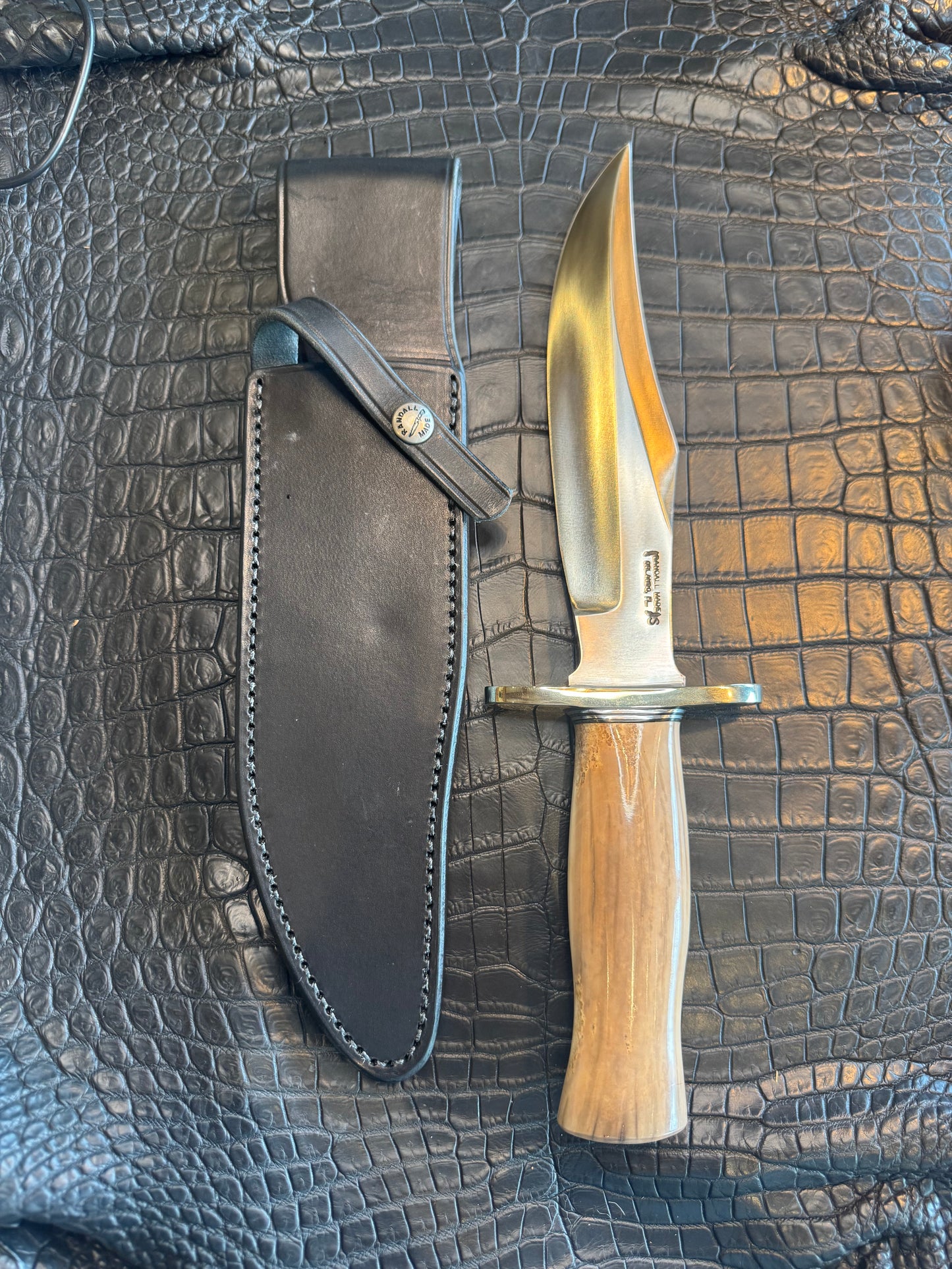 Randall Model 12-8 Big Bear in a gorgeous piece of Creamy Fossil Walrus Ivory. Nickel Silver Hilt and a natural exposed end.