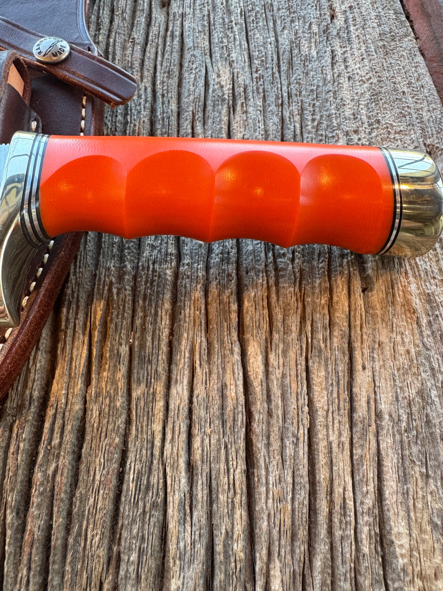 Randall Model 19-5 with a nice piece of customer supplied G10 with finger grooves. Nickel Silver Hilt and Butt cap.