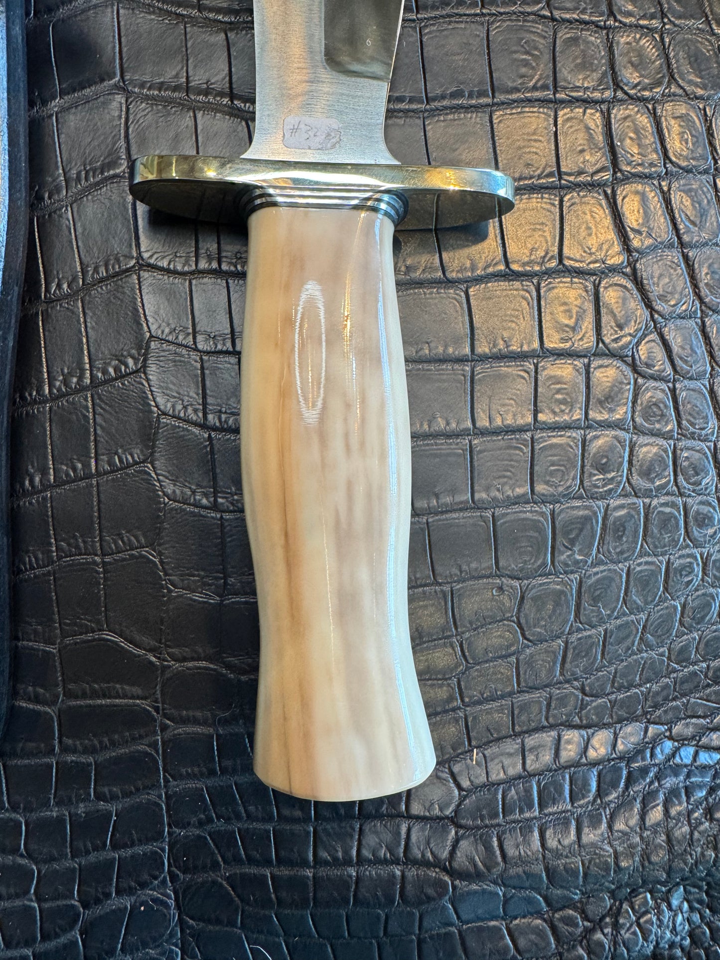Randall Model 12-8 Big Bear in a gorgeous piece of Creamy Fossil Walrus Ivory. Nickel Silver Hilt and a natural exposed end.