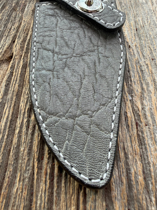 New Randall Model 19-5 Sheath in Exotic thick and textured Grey Elephant Hide on black leather from Treeman with a silver Canteen snap. Hand tooled belt loop. Killer sheath.