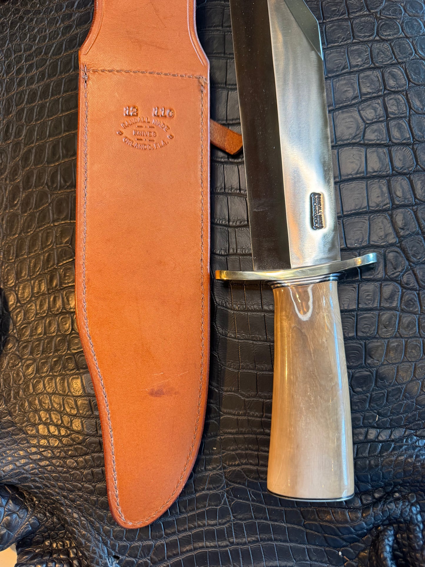 Randall Model 12-11 Smithsonian “Smitty” in a Huge piece of Green and Tan Fossil Walrus Ivory. Nickel Silver Hilt and Butt plate.
