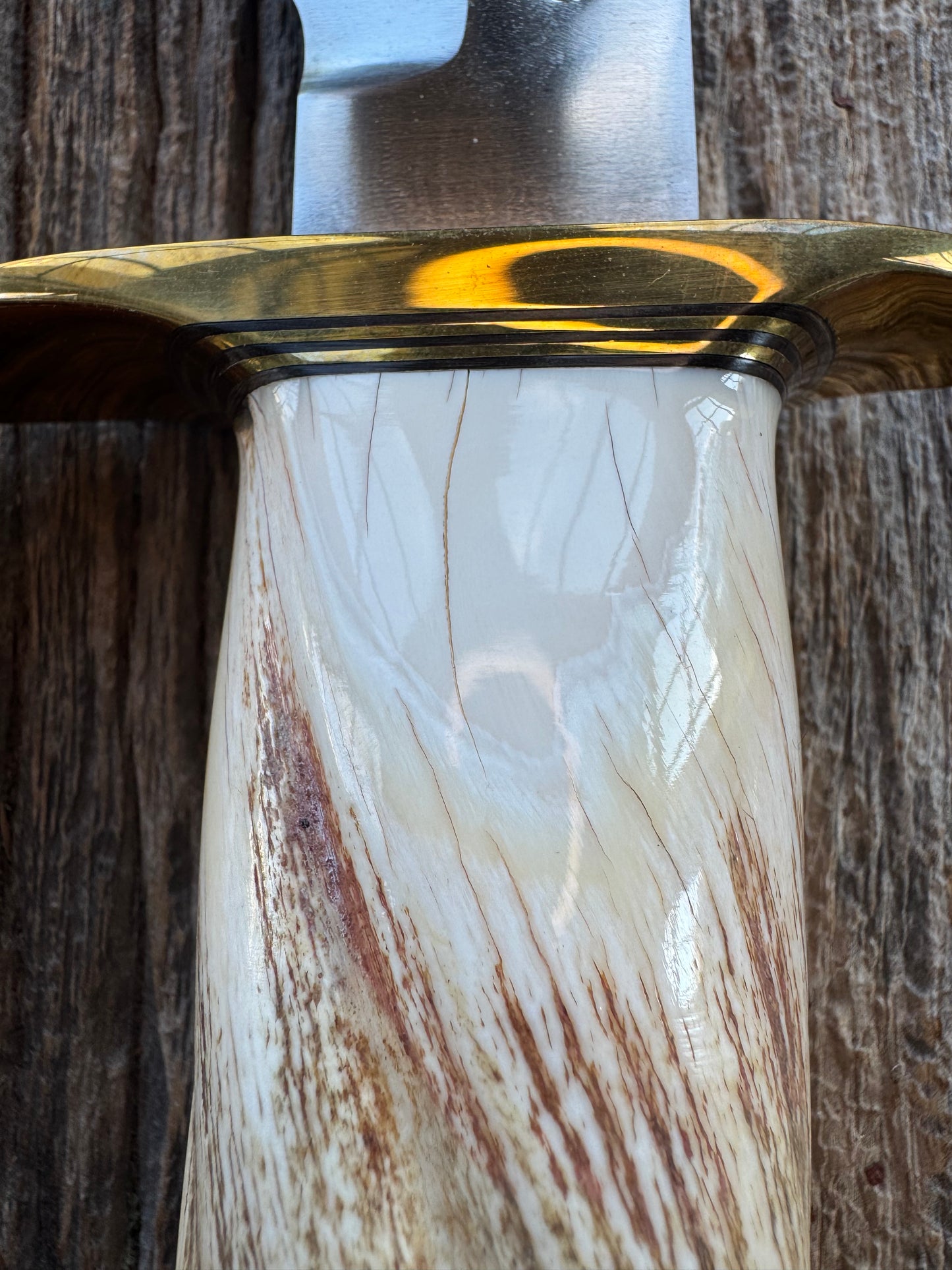 Rare Randall Model 12-9 in Beautiful Spiraled Narwal, Brass hilt and butt plate. Stainless steel, Stunning and rare. Really really fat handle.