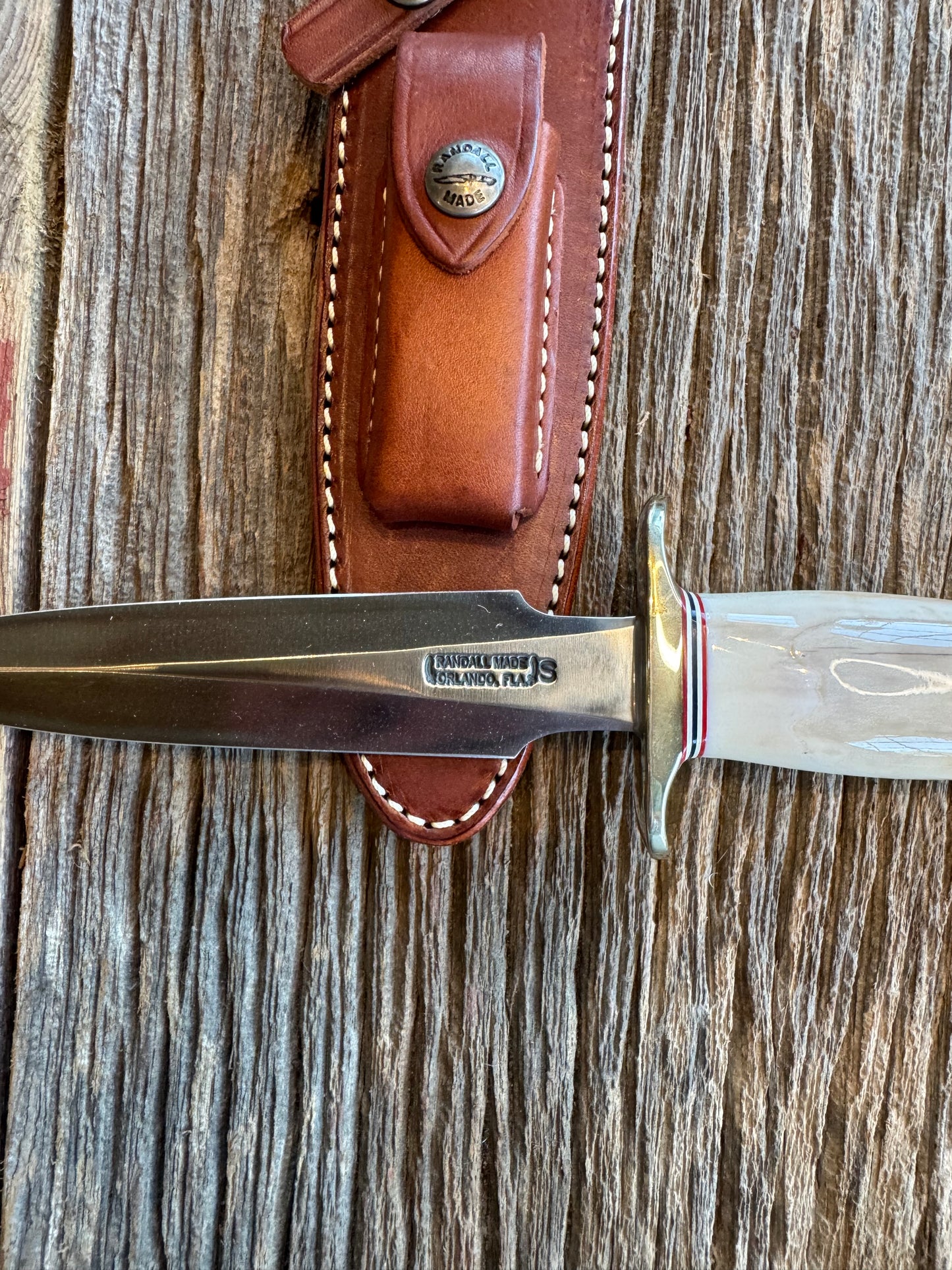 Randall Knife Model 2-6. Artifact Fossil Walrus in an Ice Ax Handle. Purchased from Rick Bowles, Stainless Steel.