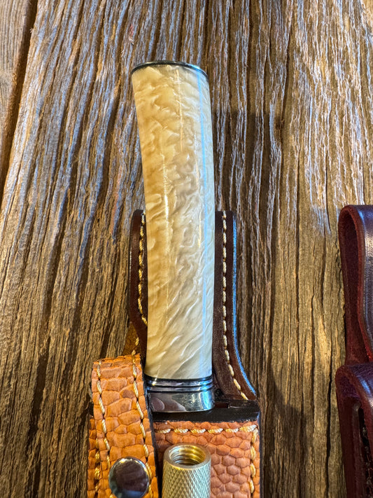 New Randall Dealer Special Stanaback Model in Musk Ox. Gorgeous all around Orange. Nickel Silver Single Hilt and butt plate. Stainless steel, bonus Beaver Sheath with Rod, Flawless knife.