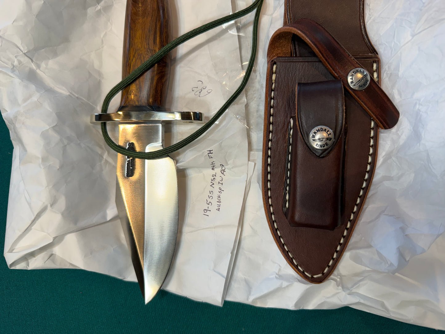 New in Paper Randall Model 19-5 with a nice piece of Ironwood. Nickel silver Hilt and Aluminum crows beak Butt cap.