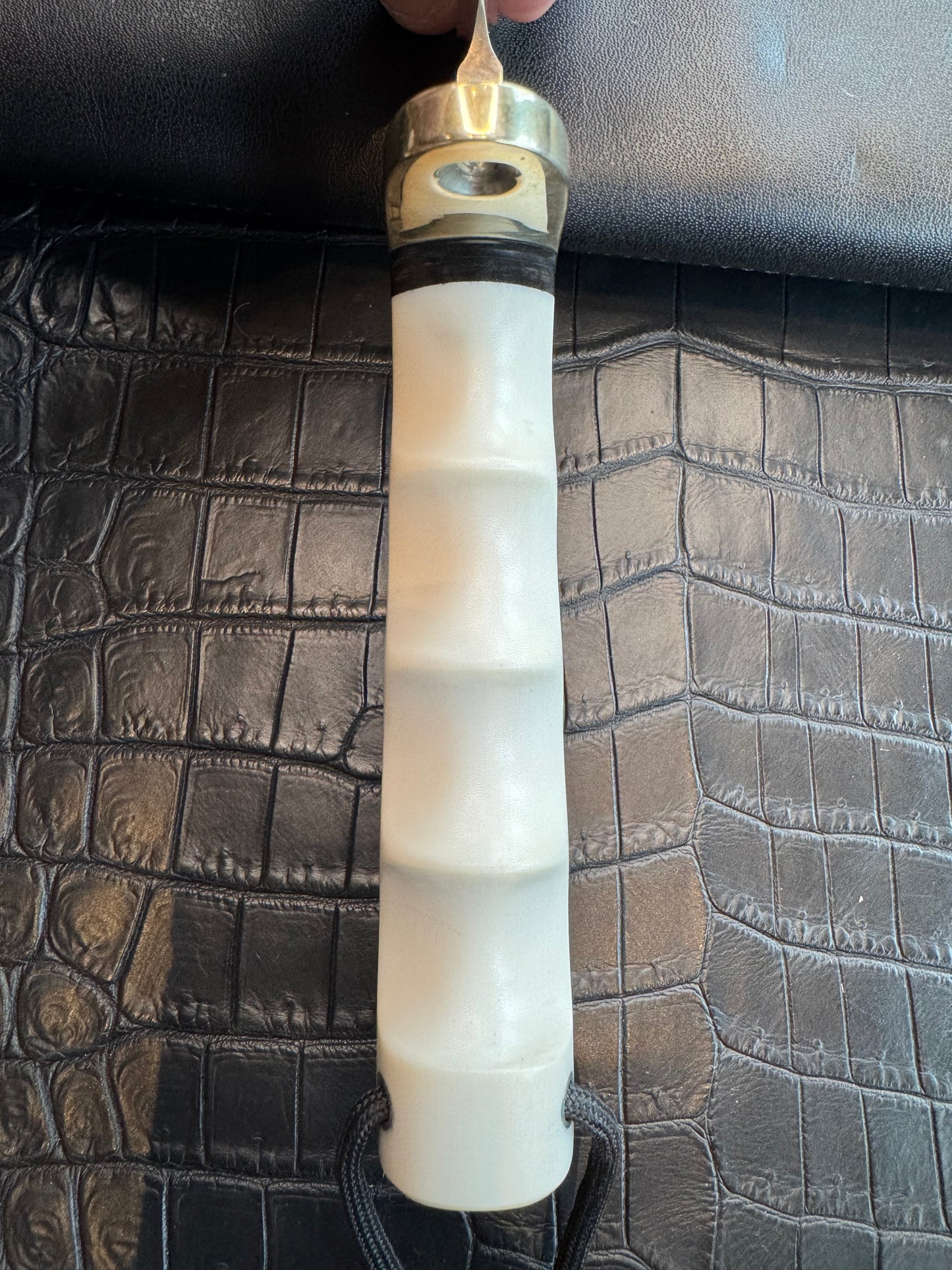 Randall Tom Clinton Dealer Special. Clinton Blade etched Commemorative 1/100 in a nice piece of finger grooved Ivorite. Very cool Black Crocodile skull Gutcher sheath. Nickel Silver Hilt. Included in black facsimile Tom Clinton case.