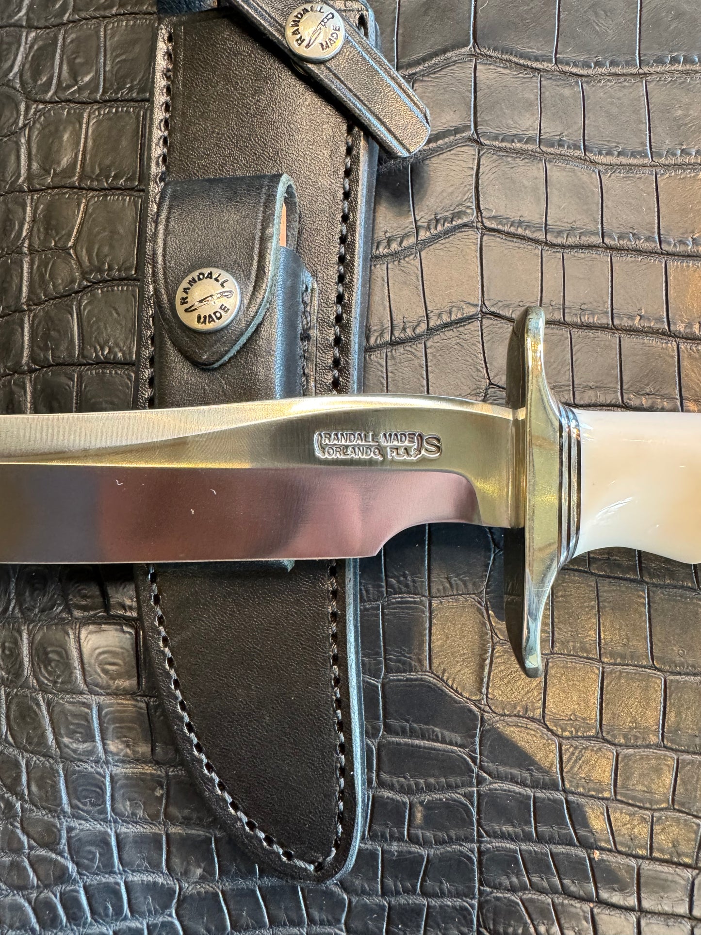 Randall Model 3-7 in Elephant Ivory with finger grooves and a natural end. Nickel Silver Hilt