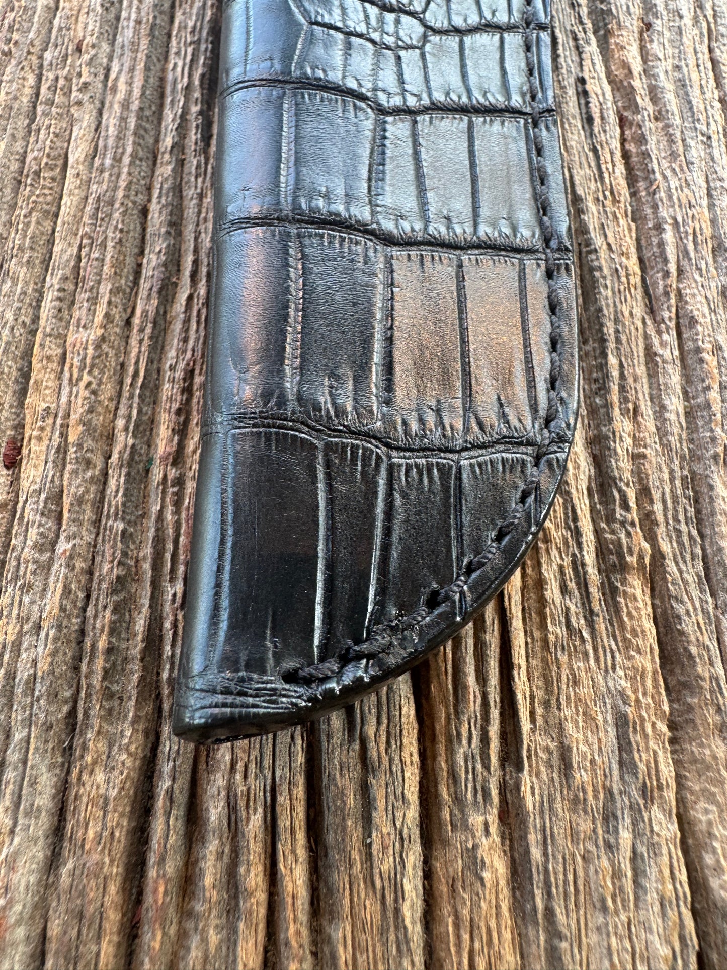 Randall Model 26 Sheath in Exotic Black Croc ( Anus Cut)Throat style from Treeman. This is a left hand sheath.