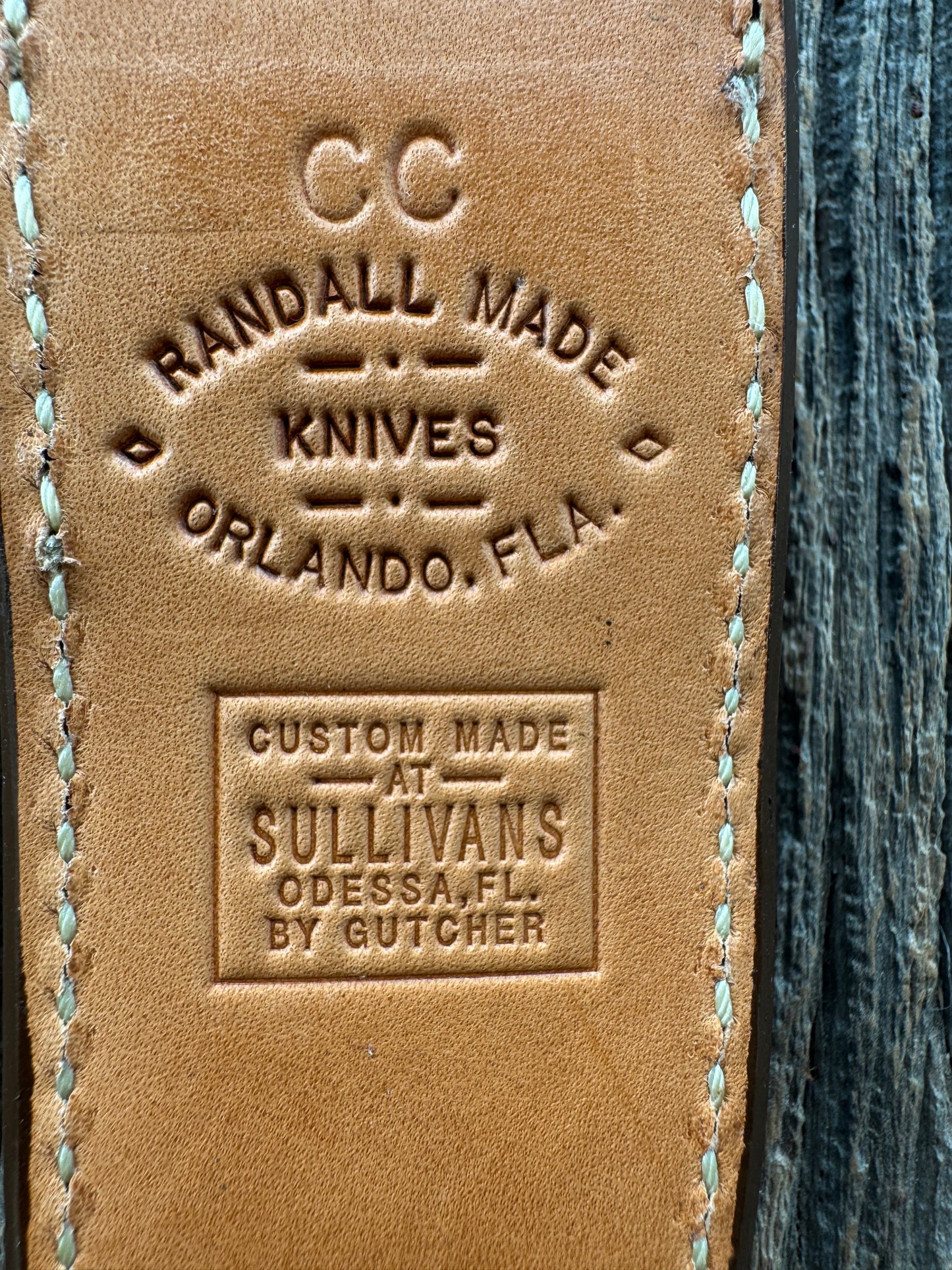 New Randall Model Combat Companion Sheath in Exotic Brown Natural Croc with full leather hand tooled belt loop. Randall snap and stamp on the back. Custom Made at Sullivan’s by Gutcher