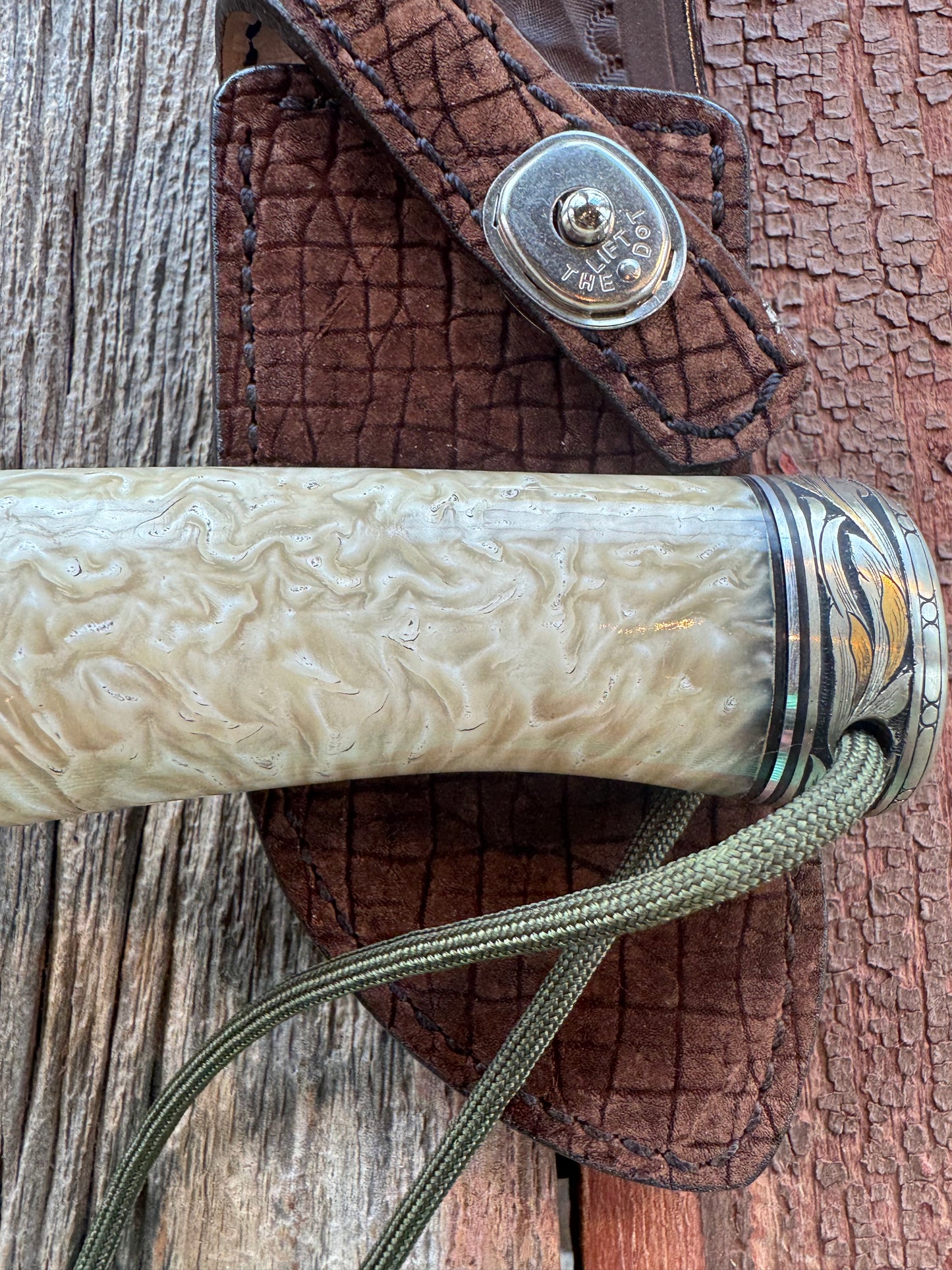 Randall Model Bowles Skinner Dealer Special Knife, perfect Musk Ox. This knife is a one of 4 per Rick Bowles. Beautifully engraved by Jere Davidson and adorned with gold and silver inlays.