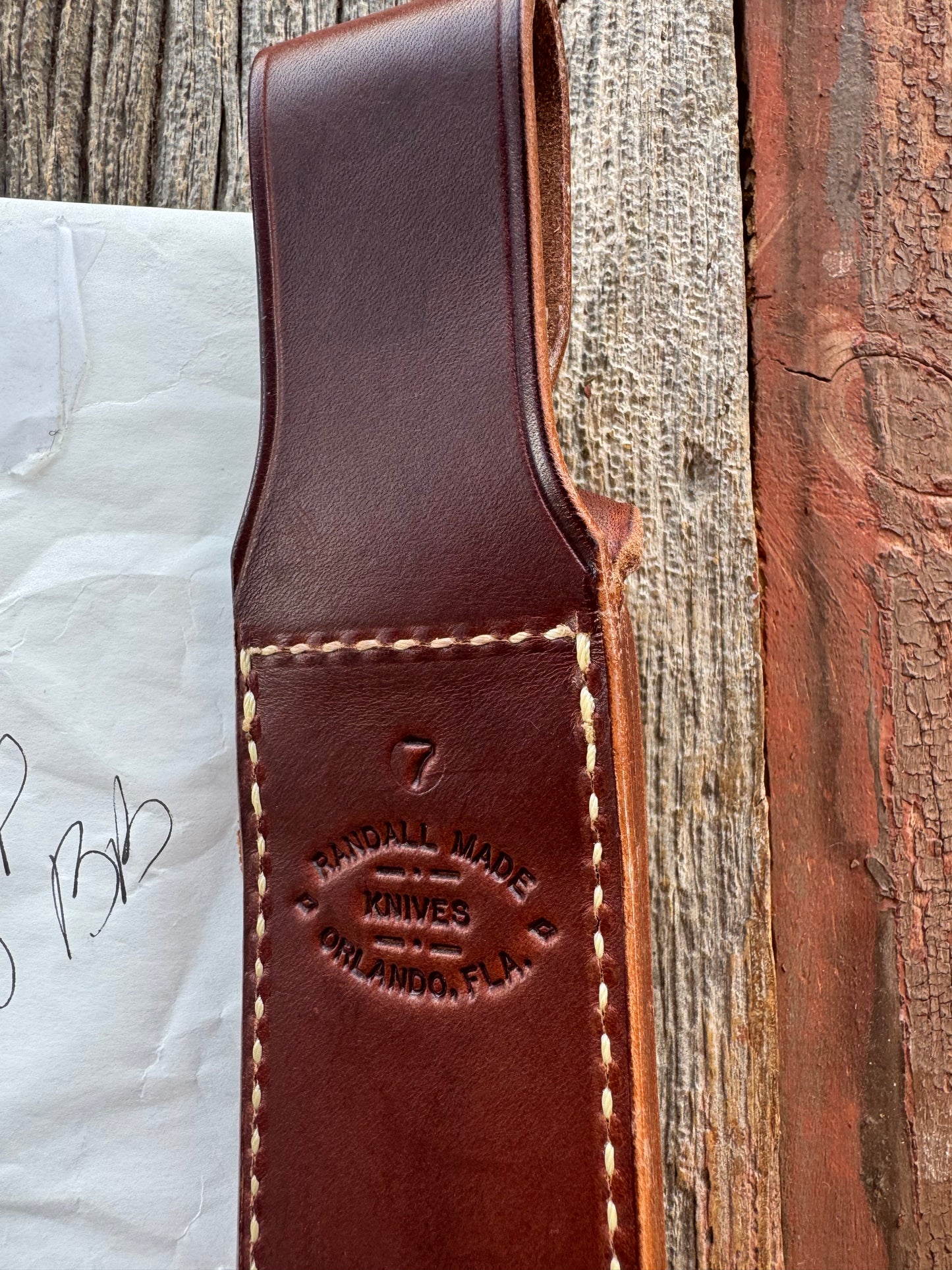 New in Paper Randall Knife Model 1-7 in Stag, Brass Hilt and Butt Cap, Black and Gold spacers.