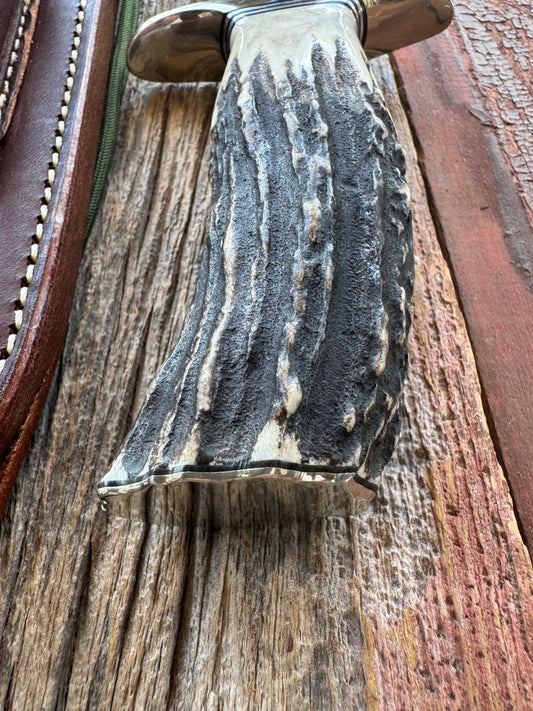 New in paper Randall Model 12-9/14 Grind Bowie with a Huge piece of Popcorn Stag. Nickel silver Hilt and Butt plate.