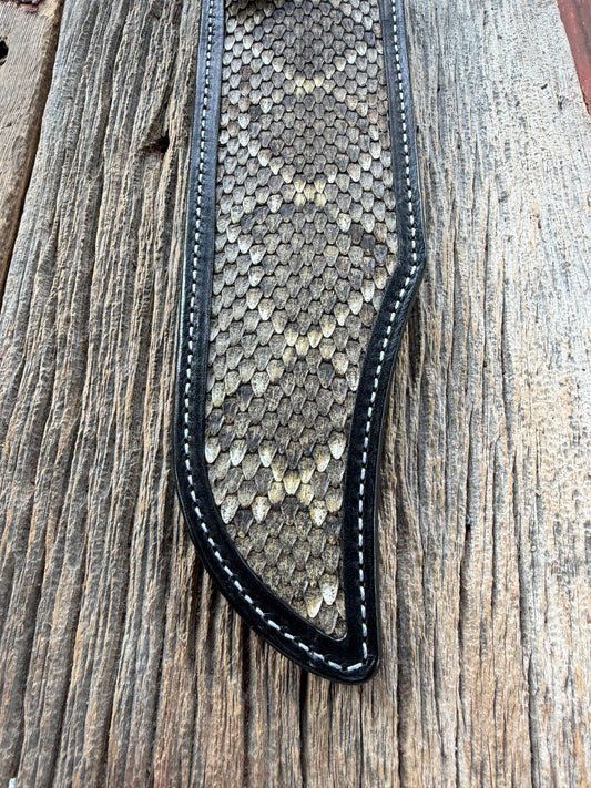 Randall Model Smithsonian sheath with a Western Diamondback RattleSnake skin inlay from Treeman Sheaths. Very dark skin, white thread deviated stitching, black canteen snap.