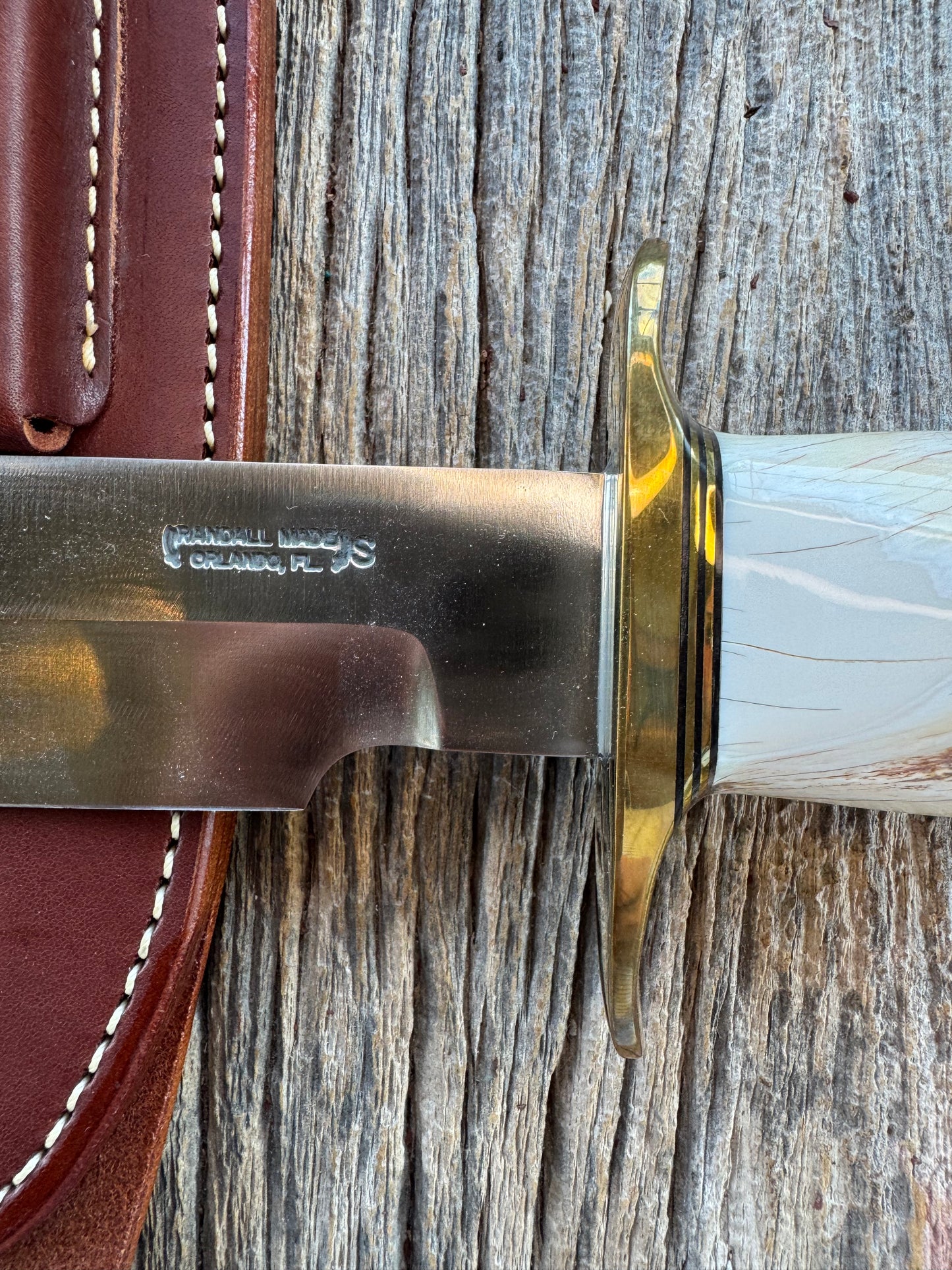 Rare Randall Model 12-9 in Beautiful Spiraled Narwal, Brass hilt and butt plate. Stainless steel, Stunning and rare. Really really fat handle.