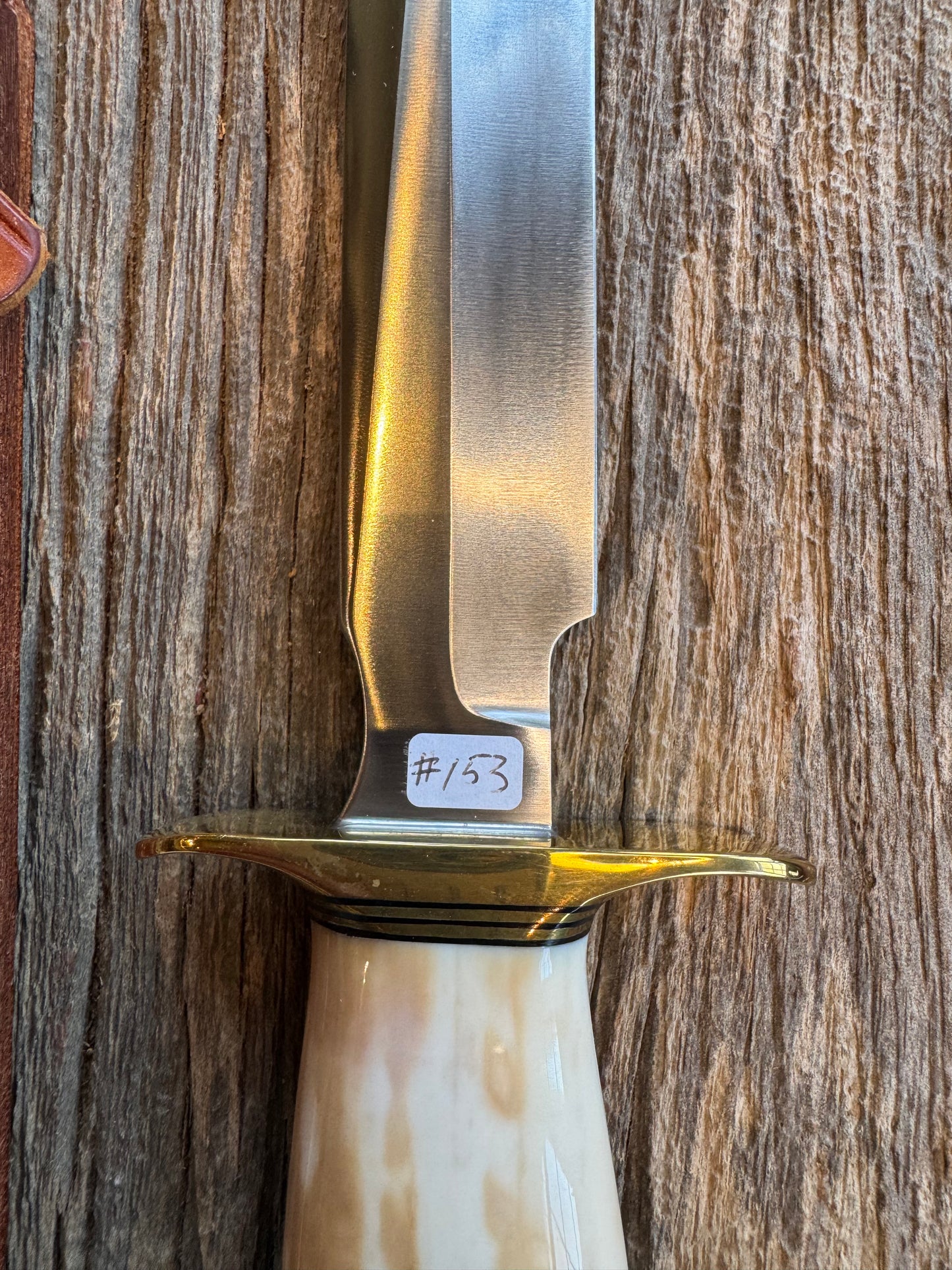 Randall Knife Model 1-8 Creamy Fossil Walrus Handle. From the Jim Gates Collection via Rick Bowles. Stainless Steel, Brass Hilt and butt plate.