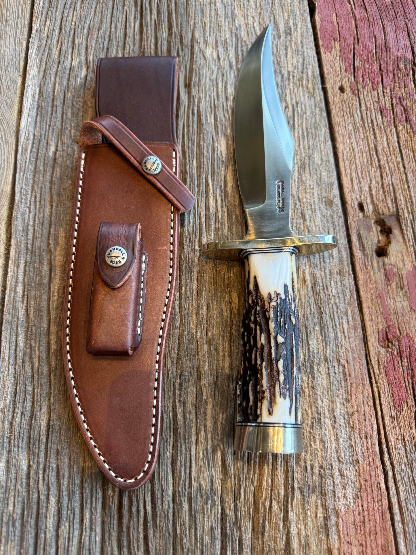 New in paper Randall Knife Model 12-8 “Big Bear” Large piece of Gnarly Popcorn Stag. Nickel silver hilt and butt cap. Stainless steel.