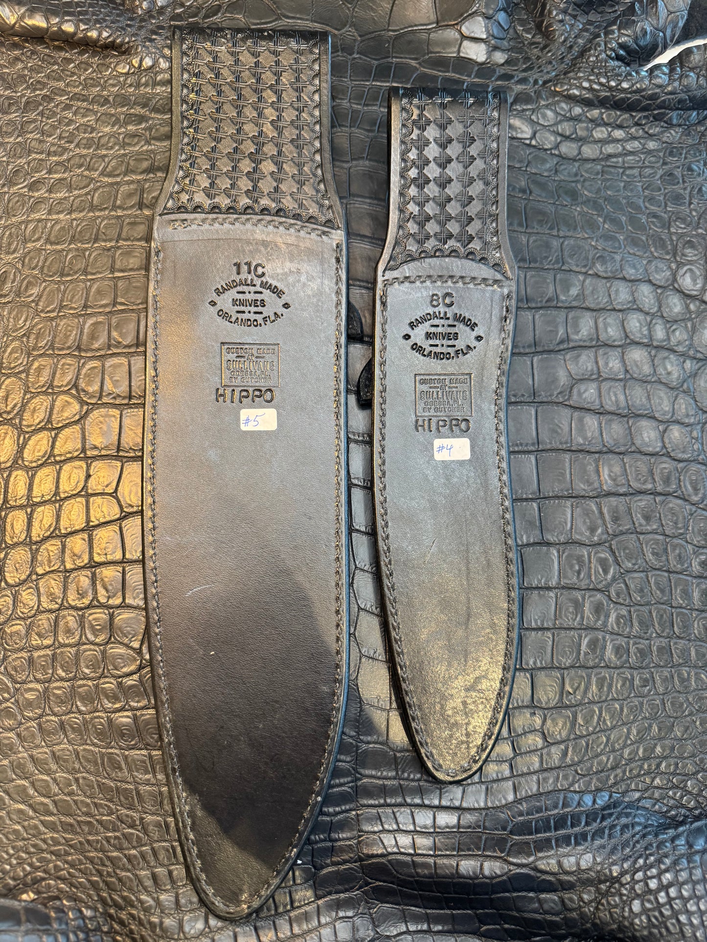 New Randall Pair of Model 12-11 Large Sasquatch and matching 12-8 Small Sasquatch Sheath’s in Exotic Black Hippo (very rare) Custom Made at Sullivan’s by Gutcher.