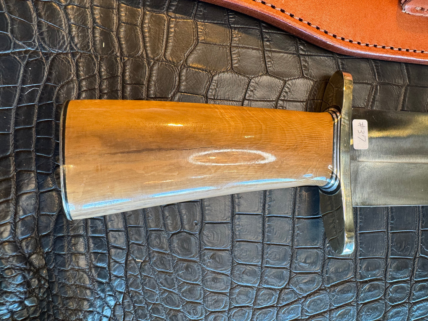 Randall Model 12-11 Smithsonian “Smitty” in a Huge piece of Green and Tan Fossil Walrus Ivory. Nickel Silver Hilt and Butt plate.
