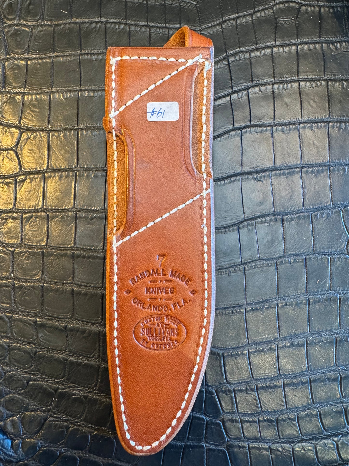 Randall Model 1-7 or 2-7 Exotic Snake skin in a low rise or high boy Sheath from Sullivans by Gutcher.