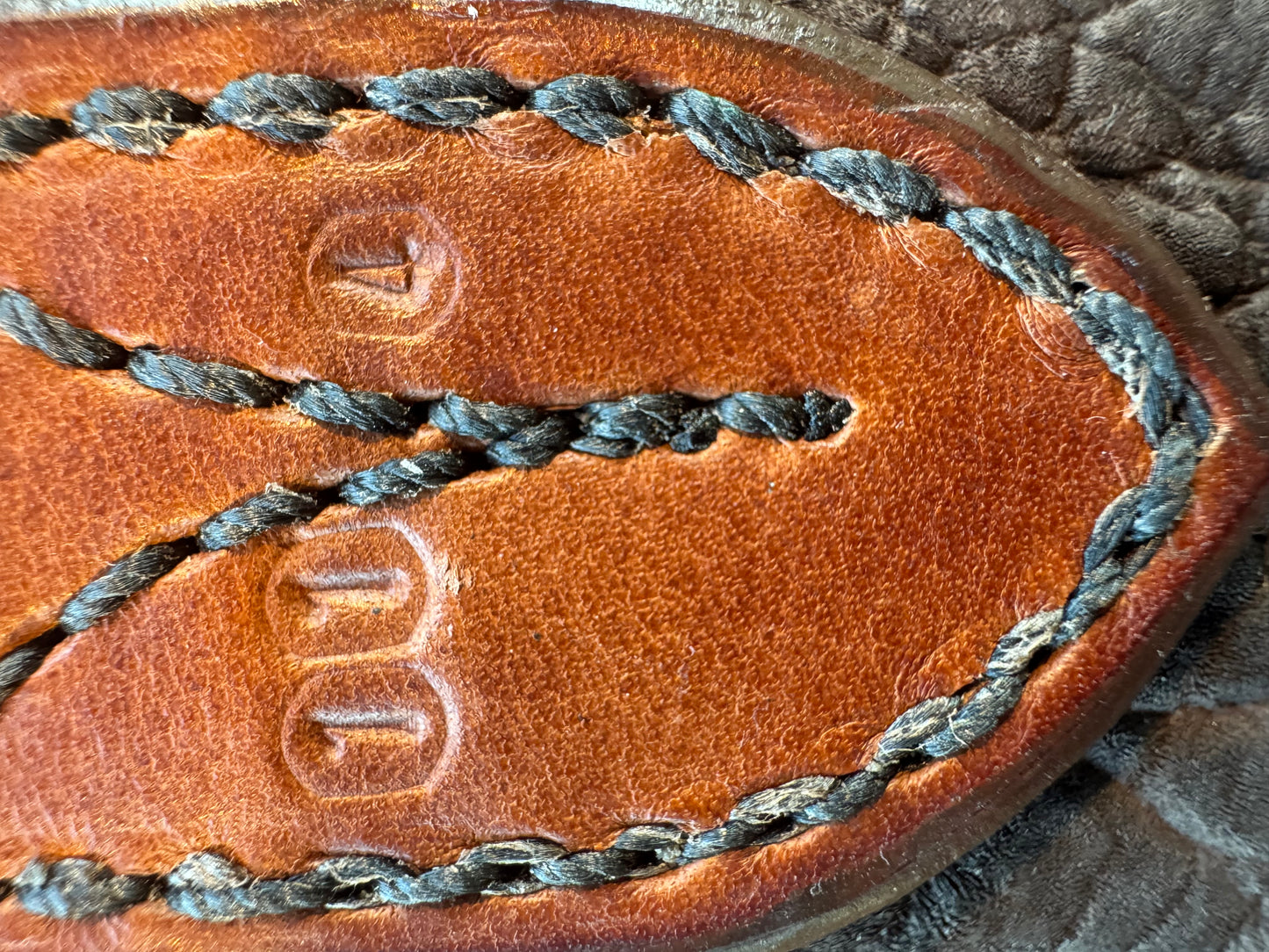 Randall Model 11-4 Sheath in Exotic faded Black Hippo. Snap closure over the hilt , belt loop on the back versus on top. (very rare) Custom Made at Sullivan’s by Gutcher.