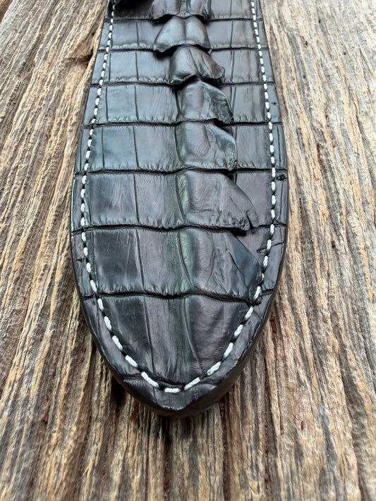 New Randall Model Clinton Special Sheath in Exotic Black Matte Crocodile tail from Treeman with a Black Canteen snap. White thread deviated stitching on black leather..Killer sheath.