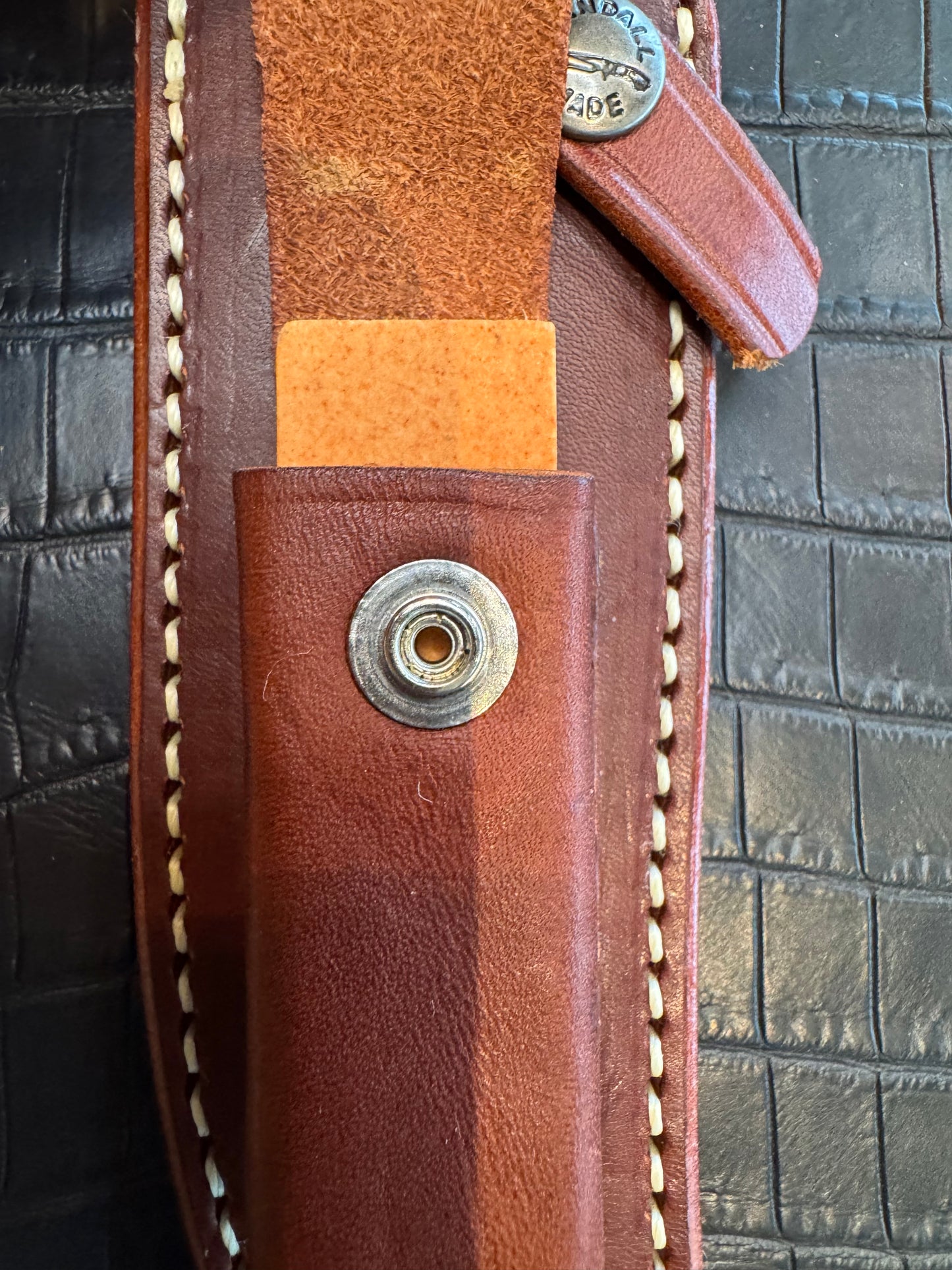 New unused Randall Model 12-6 “Little Bear” Sheath in Brown Leather made at Sullivans by Gutcher in Tampa Florida. Official sheath maker for Randall Knives.
