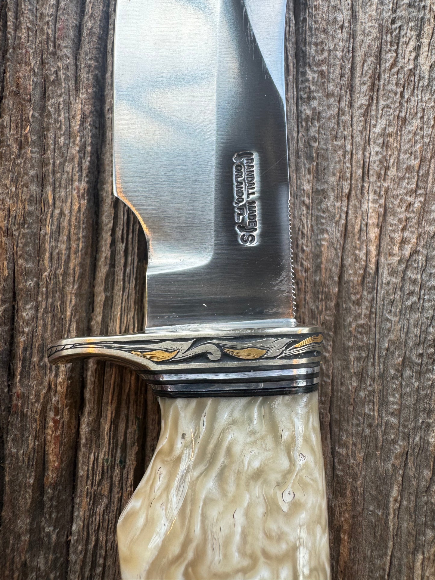 Randall Model Bowles Skinner Dealer Special Knife, perfect Musk Ox. This knife is a one of 4 per Rick Bowles. Beautifully engraved by Jere Davidson and adorned with gold and silver inlays.