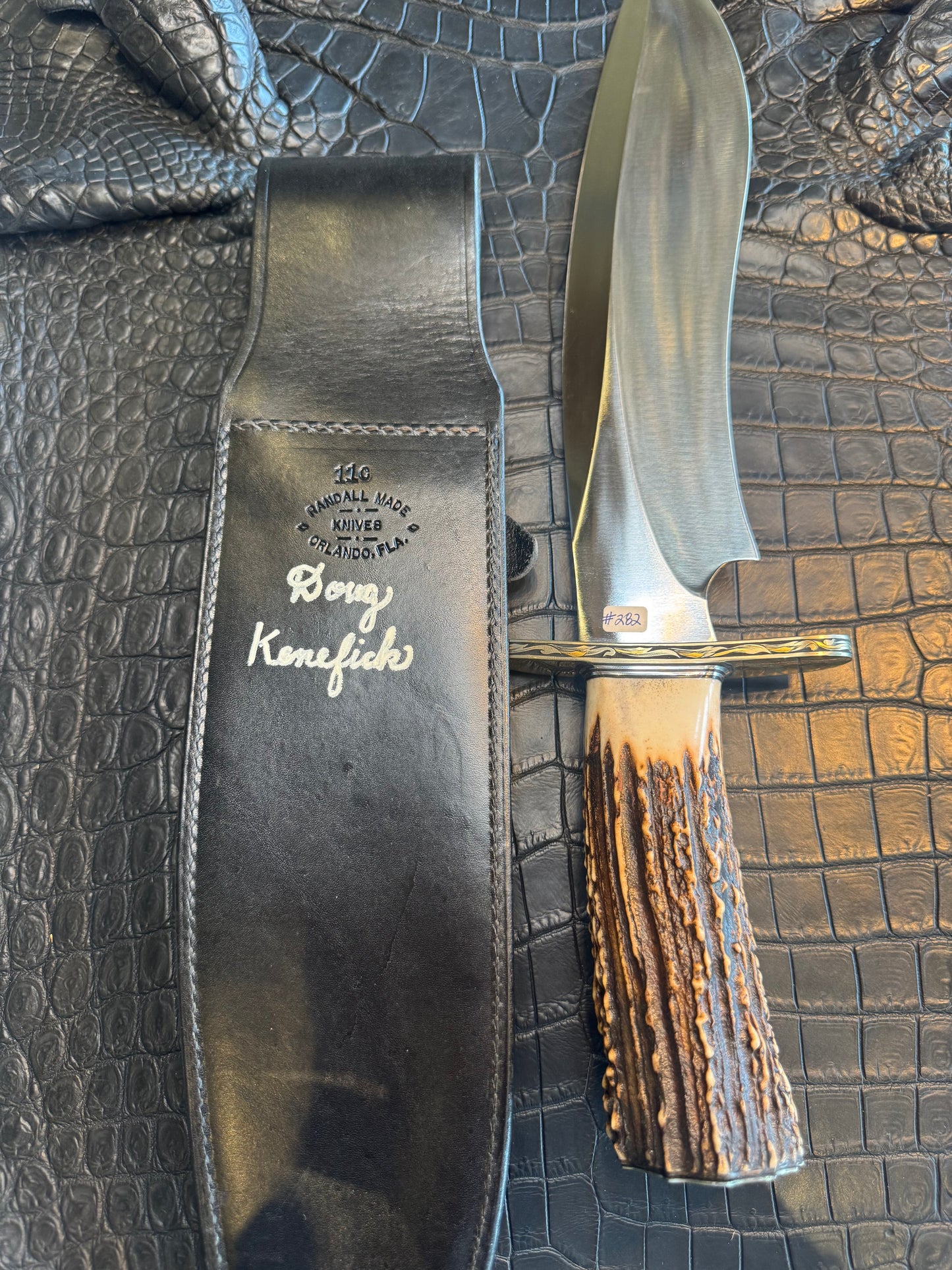 Randall Model 12-11 Dealer Special Large Sasquatch in a Huge piece of Popcorn Stag. Gold and Silver Engraved, Nickel Silver Hilt and Butt plate.