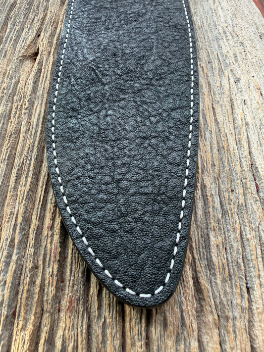 New Randall Model 12-11 Large Sasquatch Sheath in Exotic thick and textured Black Elephant hide on black leather from Treeman with a black Canteen snap. Hand tooled belt loop. Killer sheath.