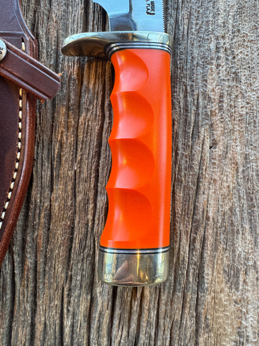 Randall Model 19-5 with a nice piece of customer supplied G10 with finger grooves. Nickel Silver Hilt and Butt cap.