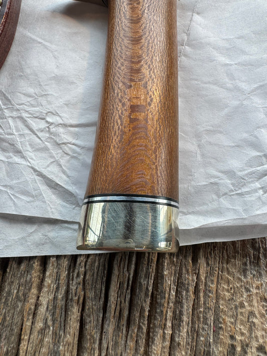 New in Paper Randall Model 19-5 Bushmaster with an Oak handle. SS blade, Nickel silver single hilt. Lanyard. Brown leather sheath.