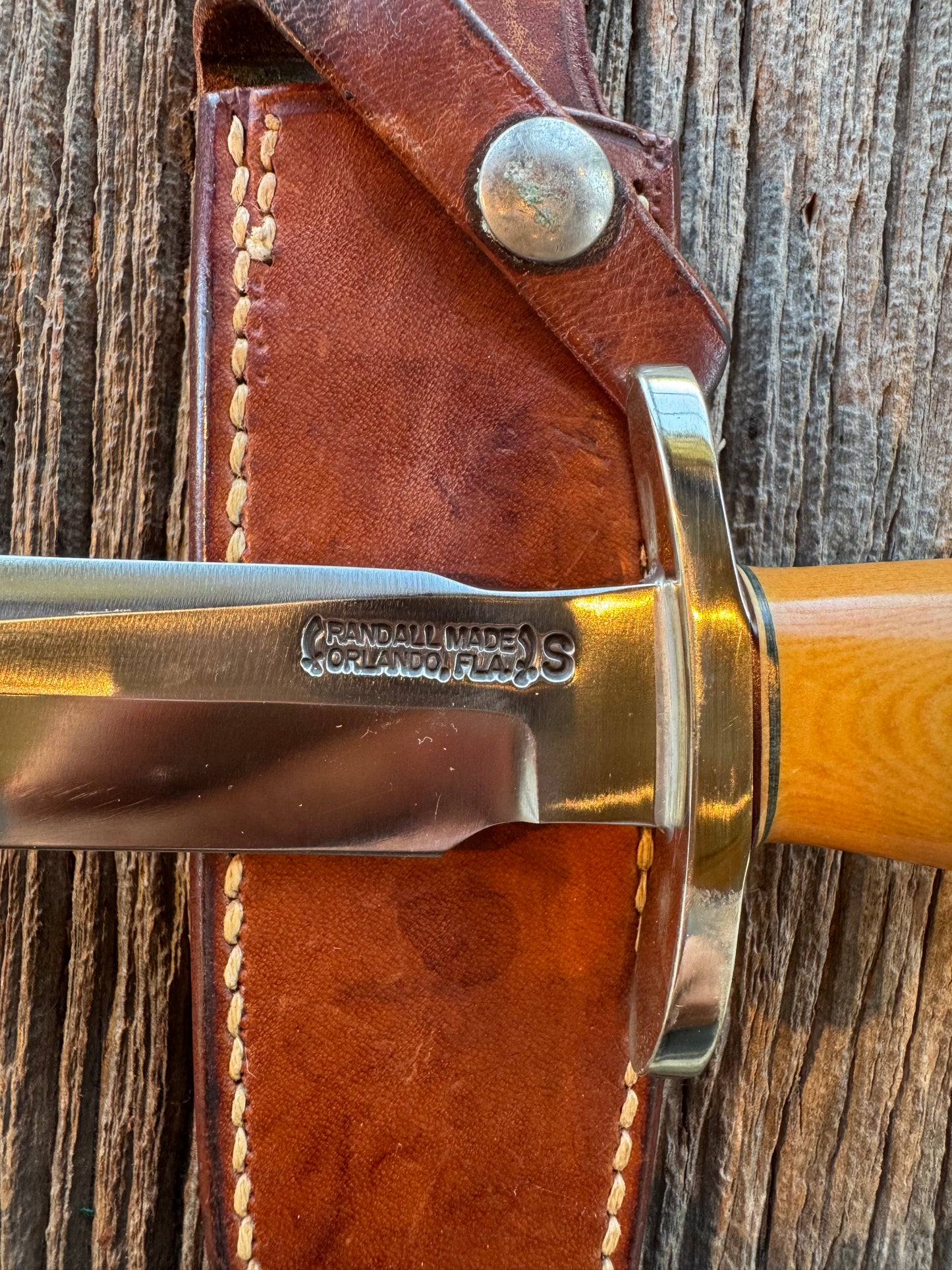 Randall Model 1-6 in Yellow Westinghouse Micarta, Nickel Silver Hilt, Stainless Steel. Etched blade, Johnson Roughback Sheath.