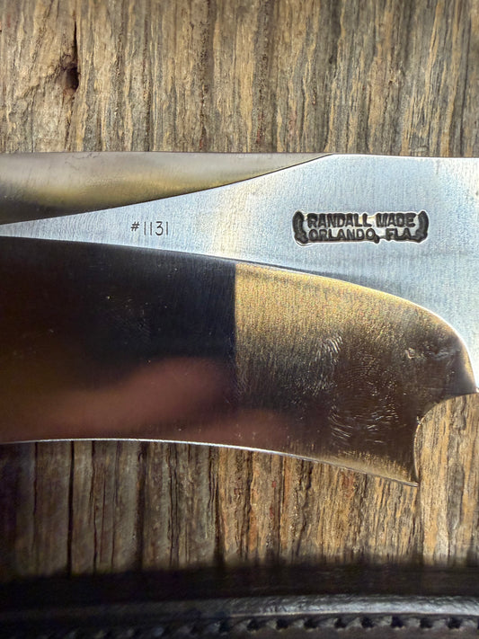 Randall Model 12-11 Dealer Special Large Sasquatch in a Huge piece of Creamy Fossil Walrus Ivory. Nickel Silver Hilt and Butt cap.