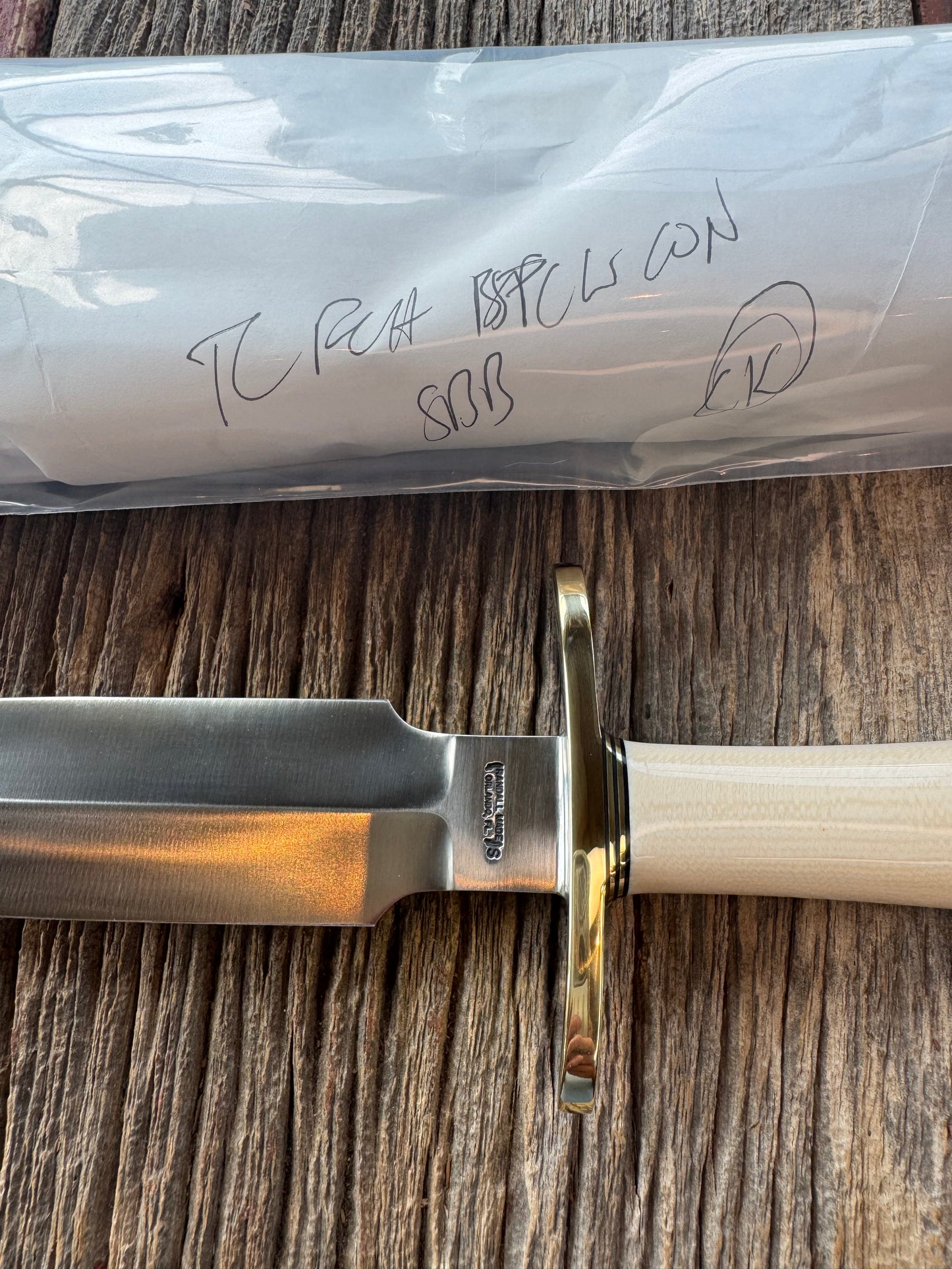 New in paper Randall Clinton Special with a nice piece of customer supplied Warthers Resin with concave grip, Stainless Steel, Brass Hilt and brass coolie cap.