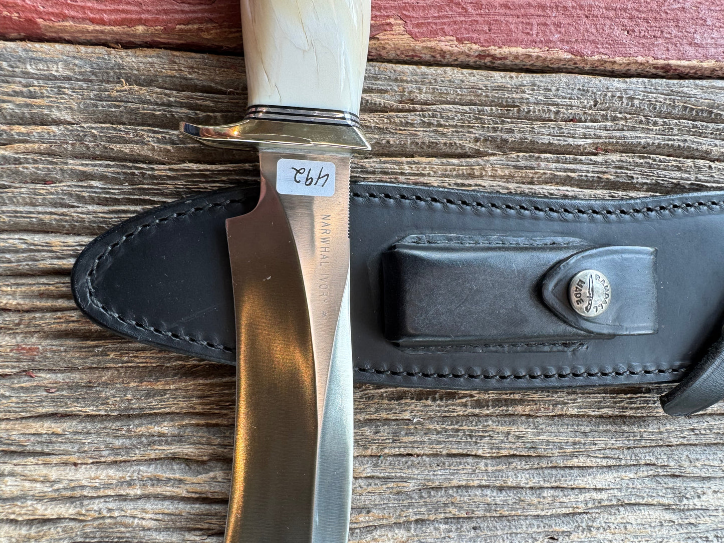 Rare Randall Model Small Sasquatch in Beautiful Spiraled Narwal, Nickel Silver hilt and aluminum crows beak butt. Stainless steel, Stunning and rare.