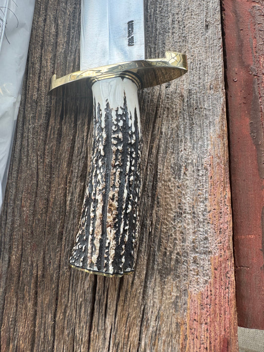 New in Paper Randall Model 12-11 Smithsonian “Smitty” in a Huge piece of Popcorn Stag. Brass Lugged Hilt and Butt plate.