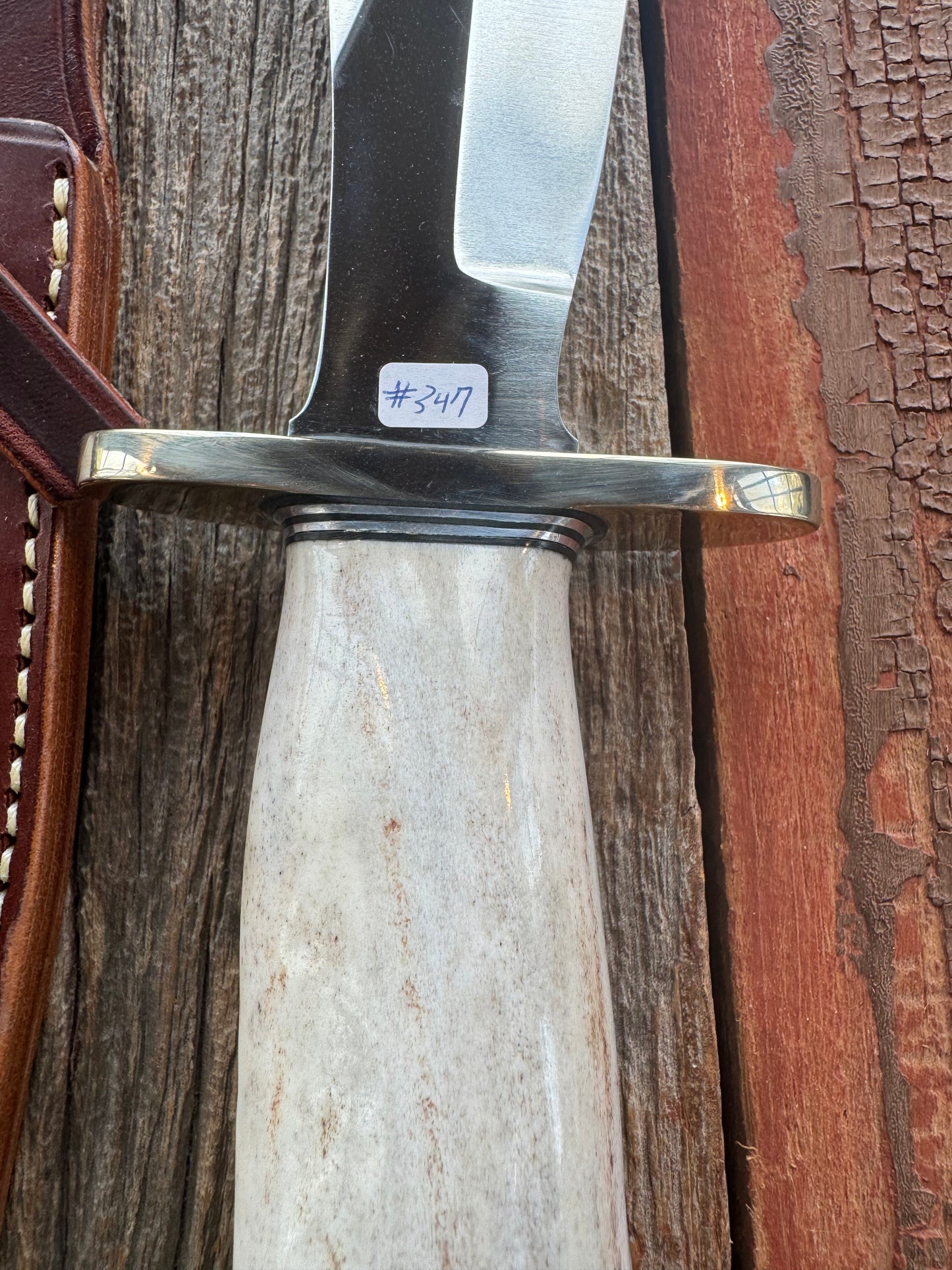 Randall Model 12-8 Big Bear in a gorgeous piece of Polished Crown Stag. Nickel Silver Hilt and a natural exposed end. Stainless,