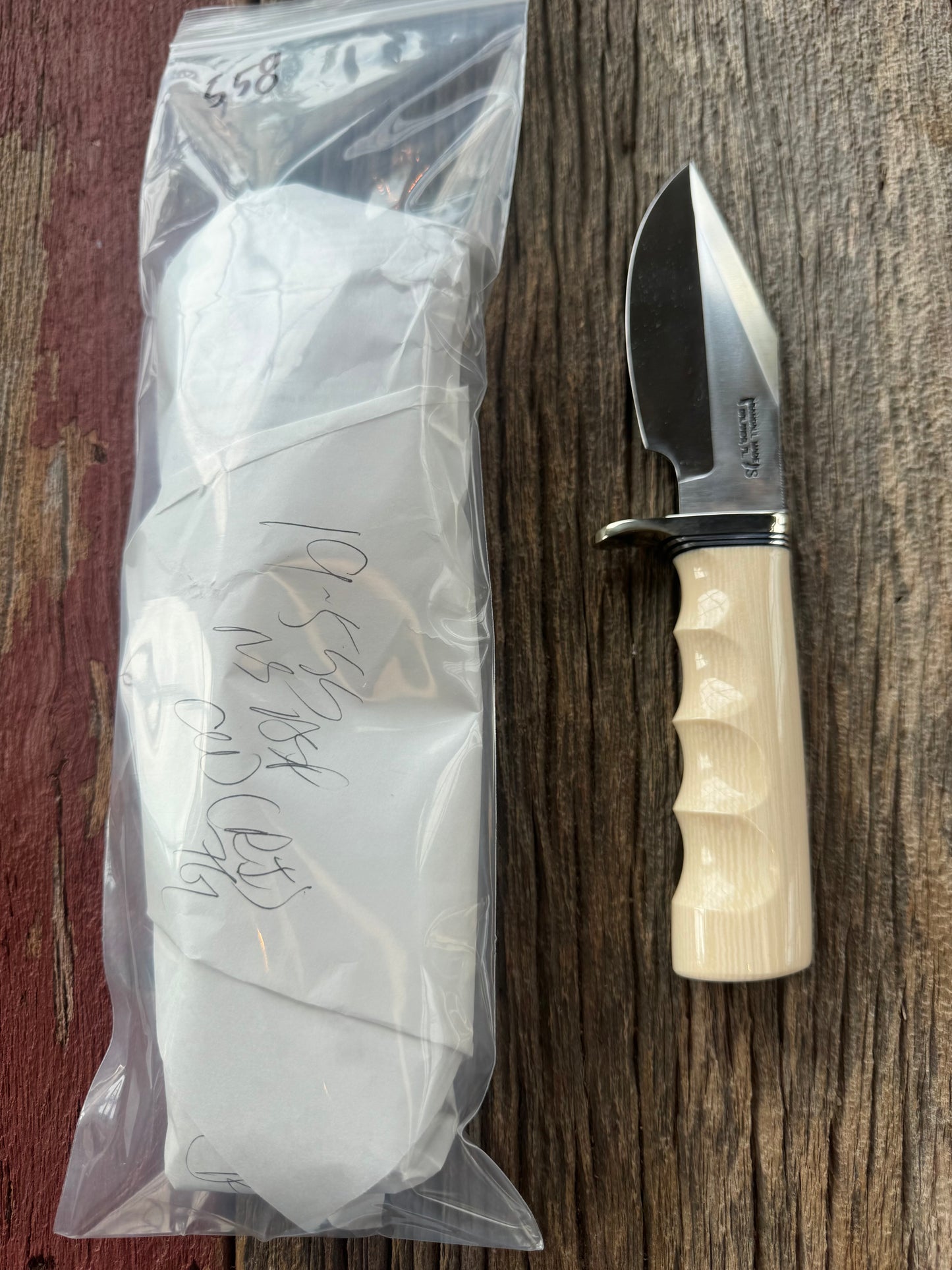 New in paper Randall Model 19-5 with a nice piece of customer supplied Dave Warthers Resin with finger grooves. Stainless Steel, Nickel Silver Hilt and natural end.