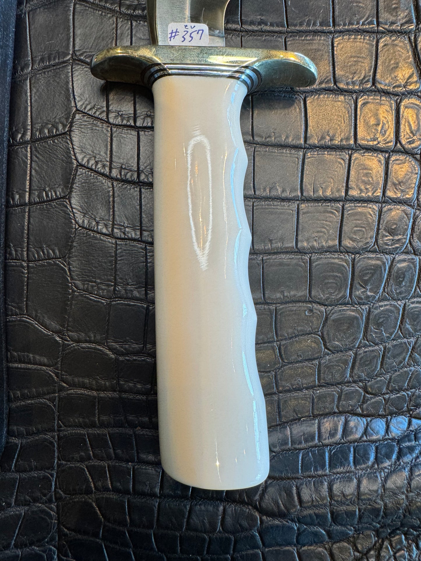 Randall Model 3-7 in Elephant Ivory with finger grooves and a natural end. Nickel Silver Hilt