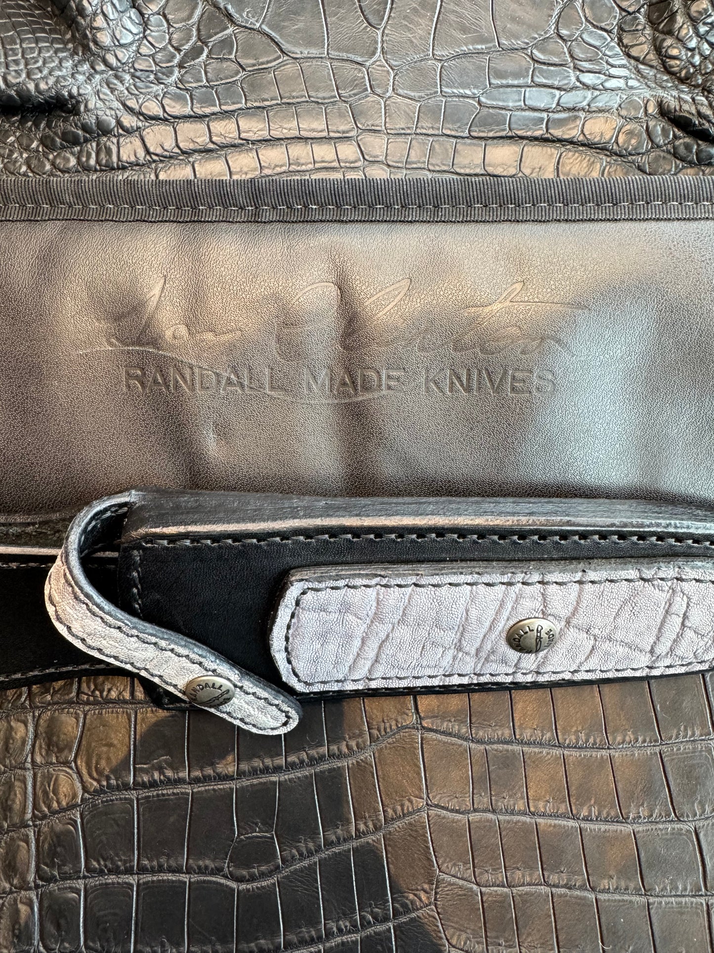 Randall Tom Clinton Dealer Special. Clinton Blade etched Commemorative 1/100 in a nice piece of Walnut. Very cool matching Elephant Gutcher sheath. Nickel Silver Hilt and Aluminum Coolie Butt cap. Included in black facsimile Tom Clinton case.