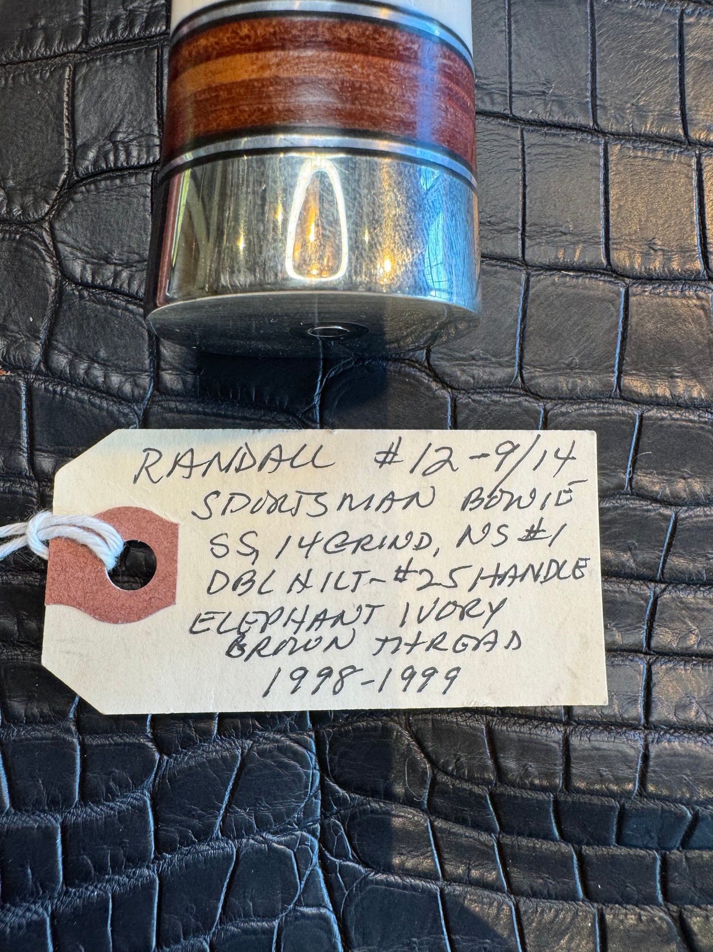 Randall Model 12/9-14 Grind Sportsman Bowie in Elephant Ivory with stacked Leather, Nickel Silver Hilt and Butt cap.