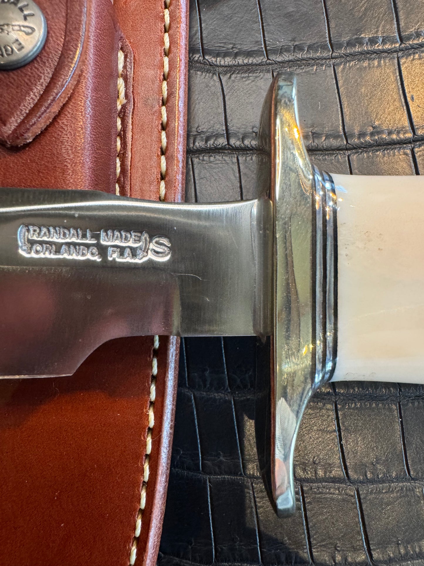 Randall Model 1-7 in a gorgeous beefy piece of Creamy Fossil Walrus Ivory. Nickel Silver Hilt and butt cap.