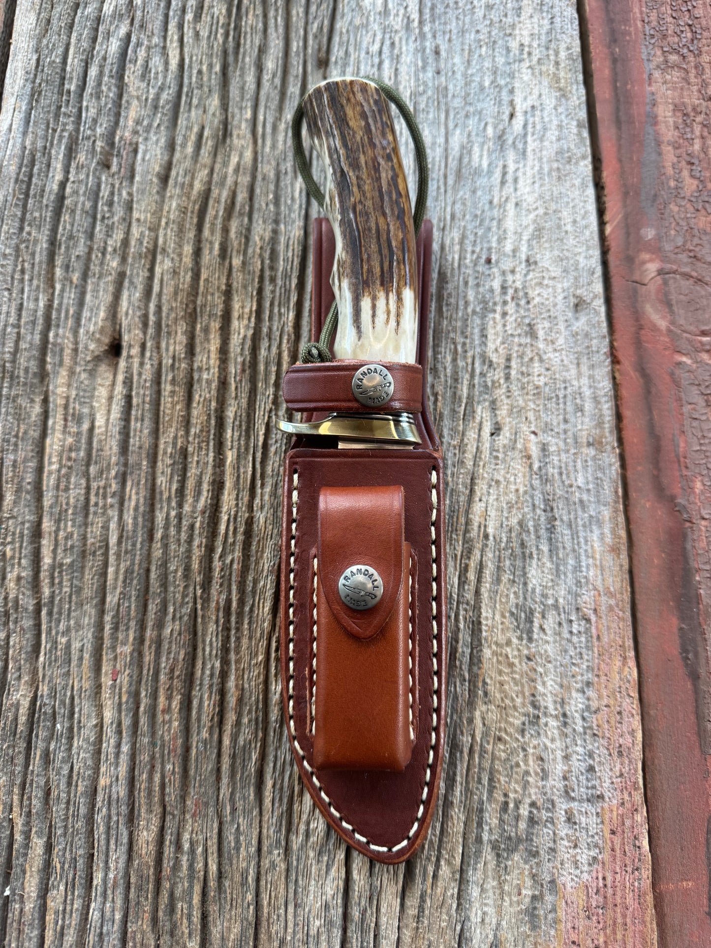 Nice Randall Model 23 Game Master in Stag with finger grooves. Stainless steel blade, Nickel silver Single hilt and Brown leather sheath.