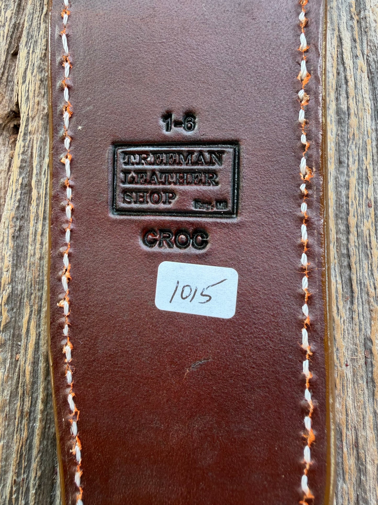 New Randall Model 1-6 Sheath in Exotic thick and textured Honey Crocodile skin on brown leather from Treeman with a silver Canteen snap. Hand tooled belt loop. Killer sheath.