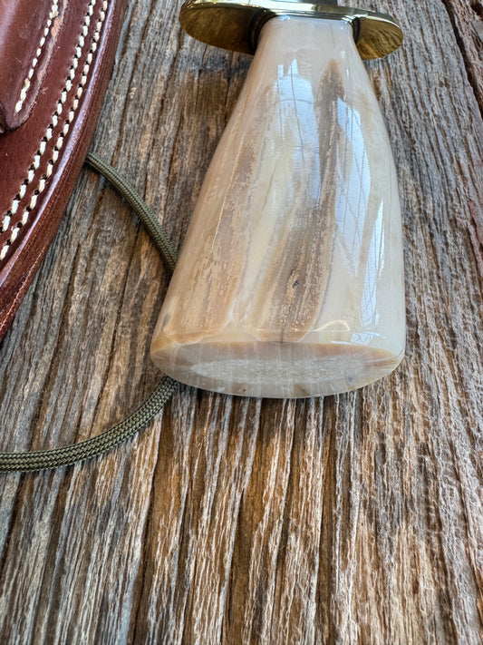 Randall Knife Model 14 Fossil Walrus Handle. From the Jim Gates Collection via Rick Bowles. Stainless Steel, Brass Hilt and natural end. Faint crack on the back side.