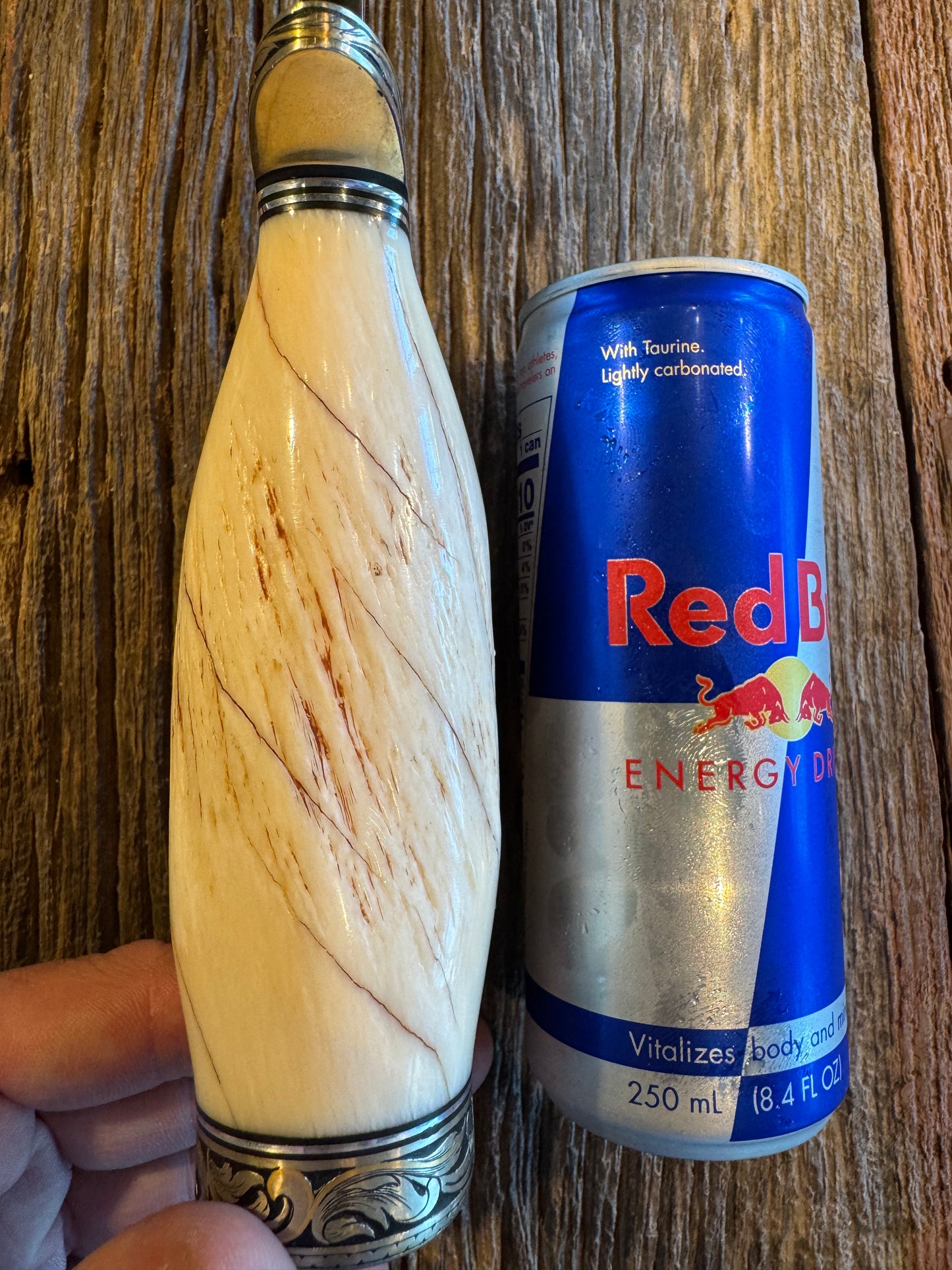 Rare Randall 12-11 Smithsonian with a huge piece of Beautiful Spiraled Narwal, Nickel Silver Hilt and butt cap both engraved and inlaid with copious amounts of gold and silver by Jere Davidson. Treeman Hippo Smitty Sheath included.