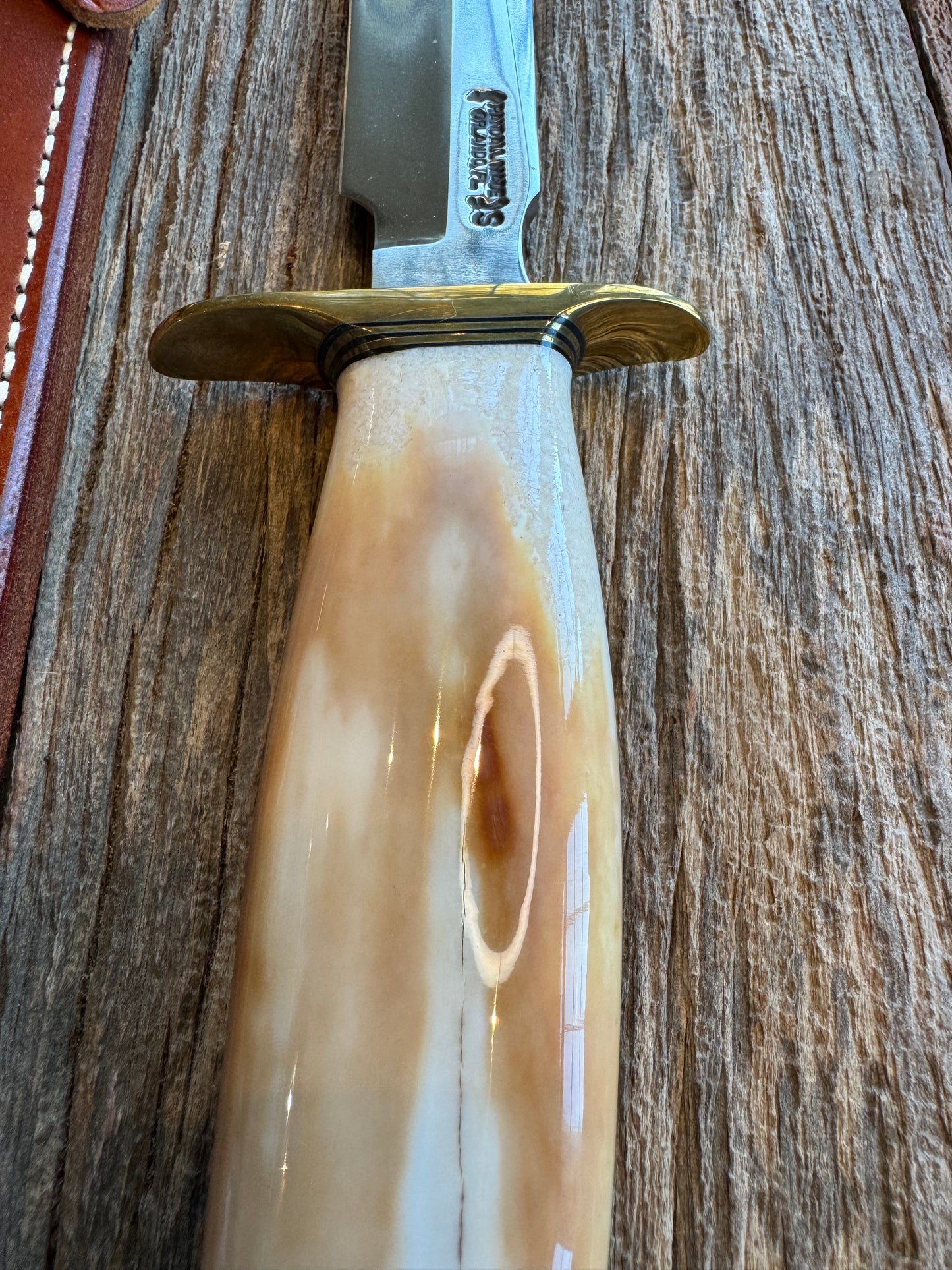Randall Knife Model 1-8 Creamy Fossil Walrus Handle. From the Jim Gates Collection via Rick Bowles. Stainless Steel, Brass Hilt and butt plate.
