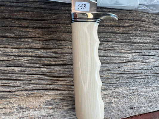 New in paper Randall Model 19-5 with a nice piece of customer supplied Dave Warthers Resin with finger grooves. Stainless Steel, Nickel Silver Hilt and natural end.